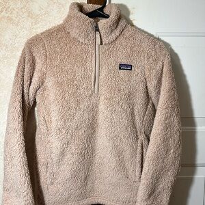 Patagonia Los Gatos 1/4-Zip Fleece Pullover in a pink/cream color.